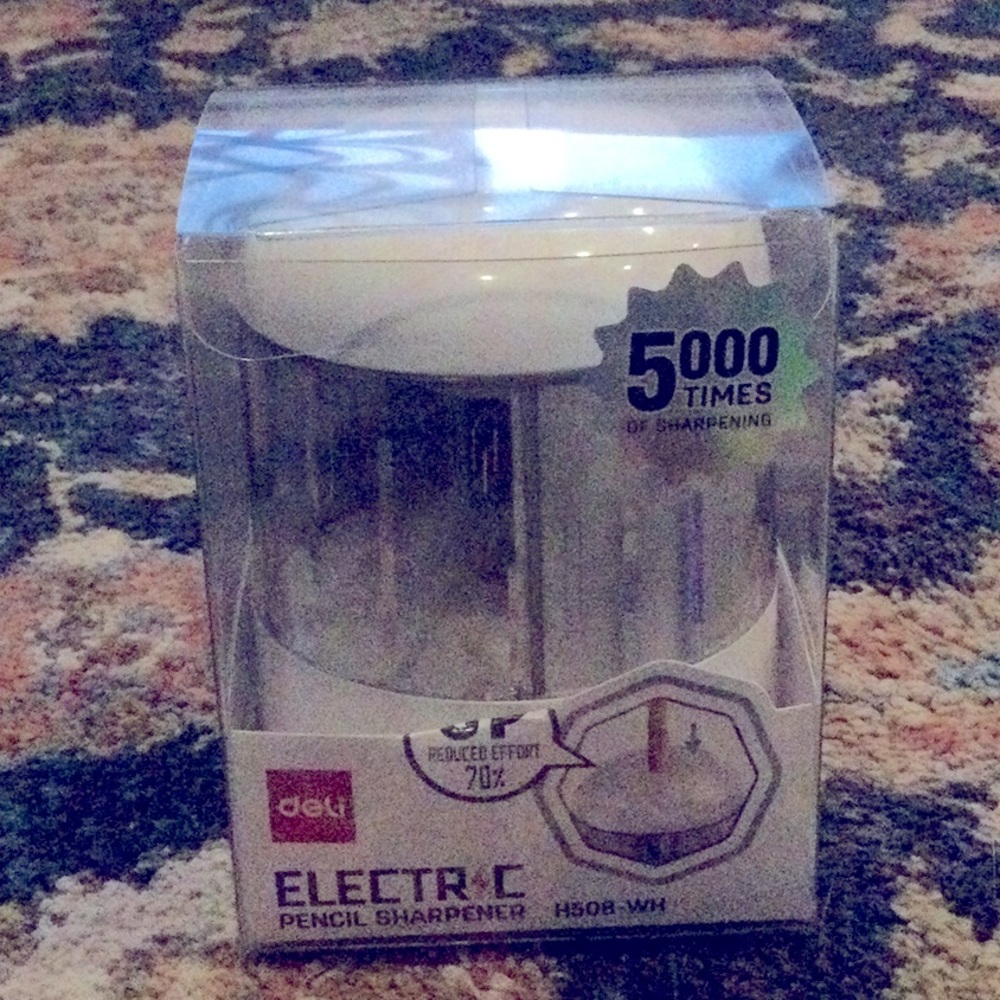 Automatic Pencil Sharpener.
